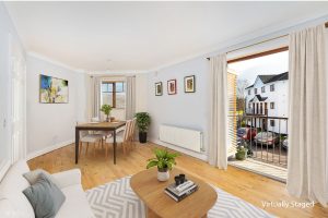 Apartment 39 livingroom balcony staged